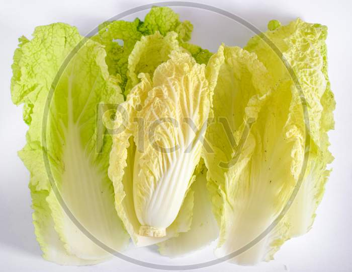 Isolated cabbage vegetables and carrots photo on white background