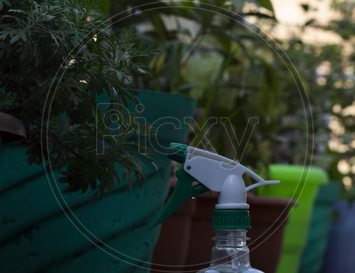 A water sprinkler kept near some plants