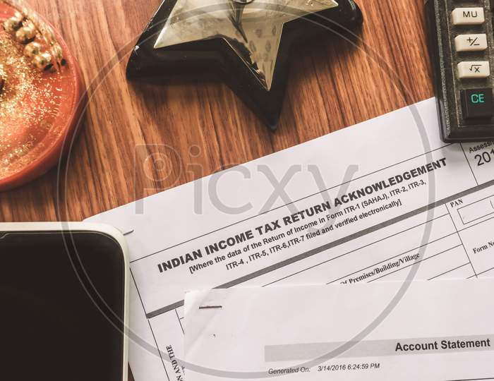 Close Up Of Indian Income Tax Return Form Itr-2 Return Form Is On The Table Next To A Pen, Calculator And A Home Mortgage Loan Application Form Placed On The Desk. Financial Business Concept.