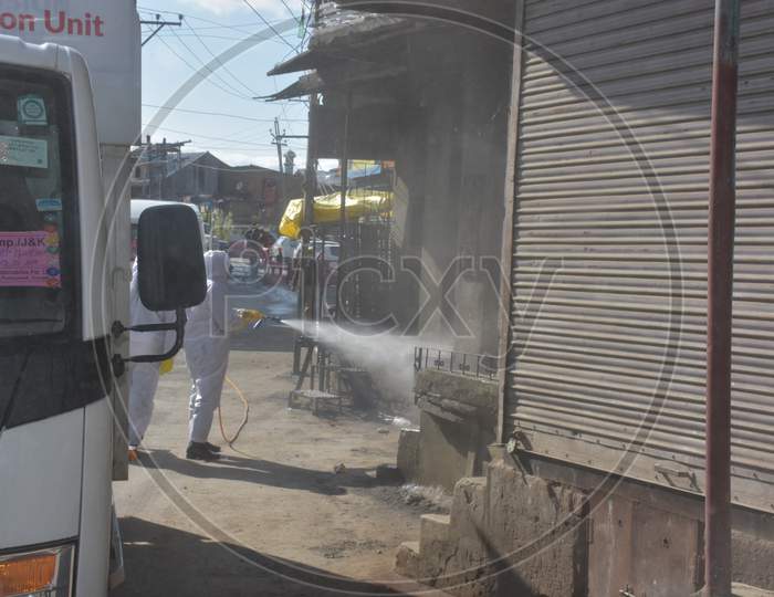 Fumigation In Srinagar City By Men Wearing Kits