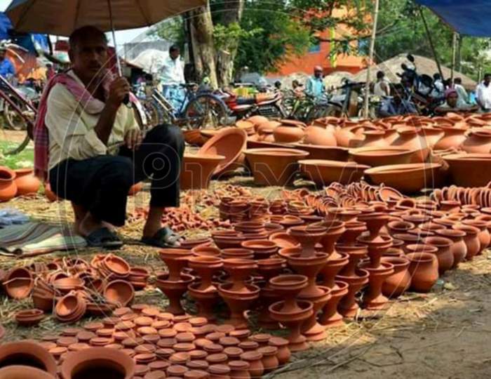 Potters are selling pottery in the market