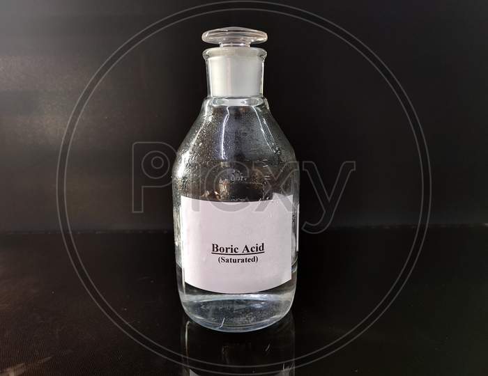 Transparent Bottle Filled With Reagent Solution boric acid