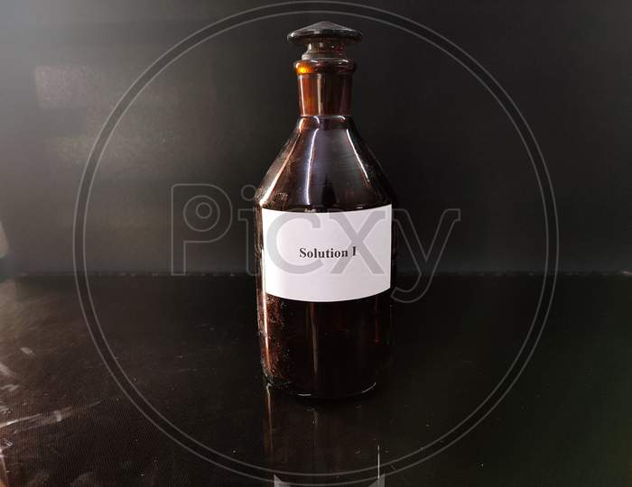 Brown Bottle Filled With Reagent Solution 4