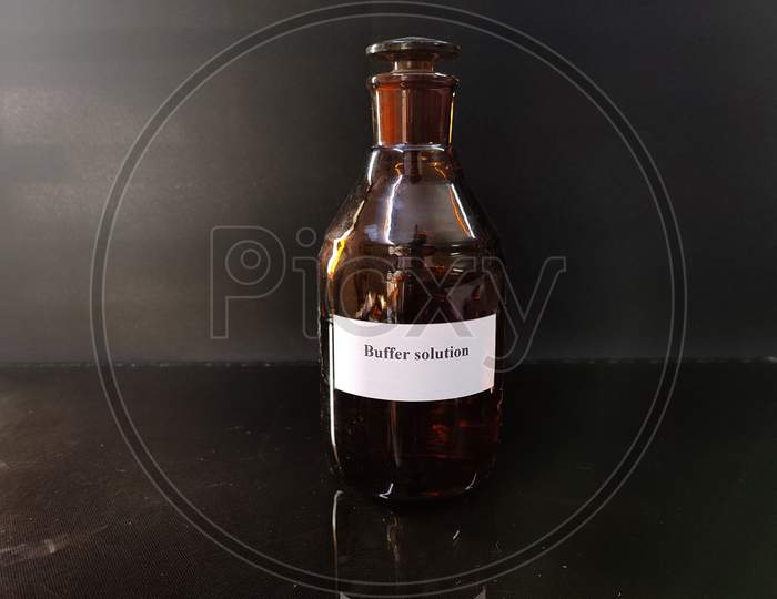 Brown Bottle Filled With Reagent Solution 12