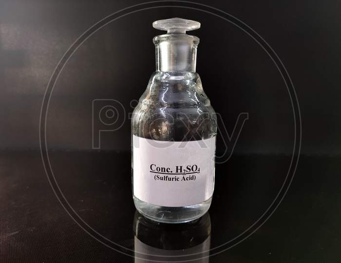 Transparent Bottle Filled With concentrated sulfuric acid