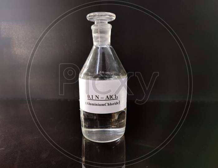 Transparent Bottle Filled With Reagent Solution Alcl