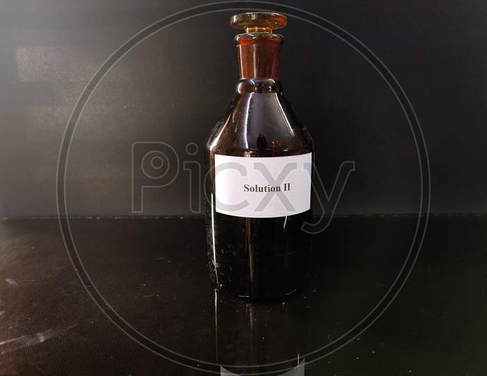 Brown Bottle Filled With Reagent Solution 3
