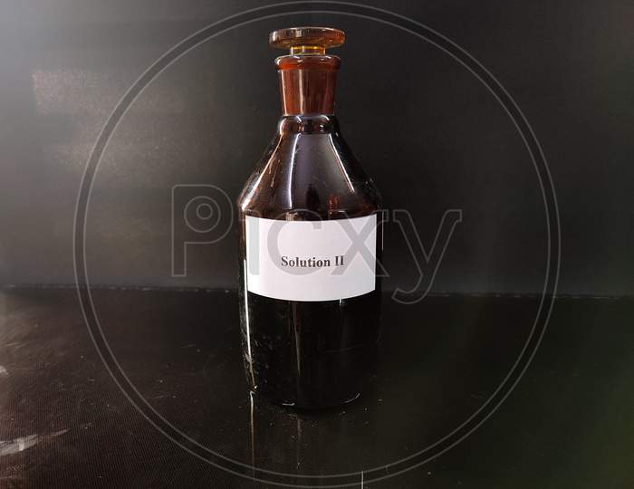 Brown Bottle Filled With Reagent Solution 1