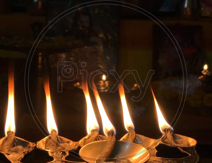 Burning Lamp Or Diya During Hindu Rituals Flame Called Aarti. Shiva Aarti Pic. Aarti Flame Given To The Gods At Night Time. Shivaratri Special Pic.