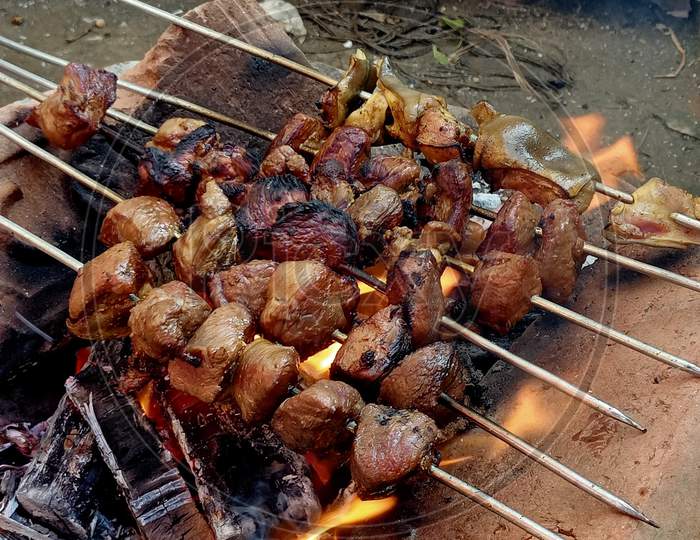 Traditional Style Of Smoky Village Barbecue In An Open Kitchen.