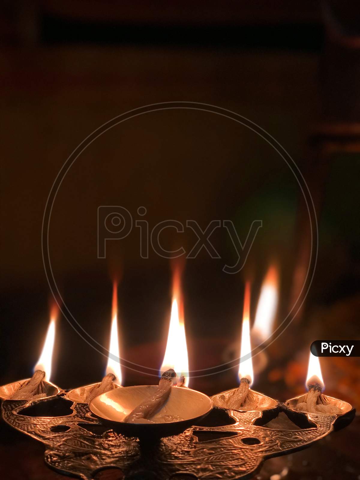 Burning Lamp Or Diya During Hindu Rituals Flame Called Aarti. Shiva Aarti Pic. Aarti Flame Given To The Gods At Night Time. Shivaratri Special Pic.