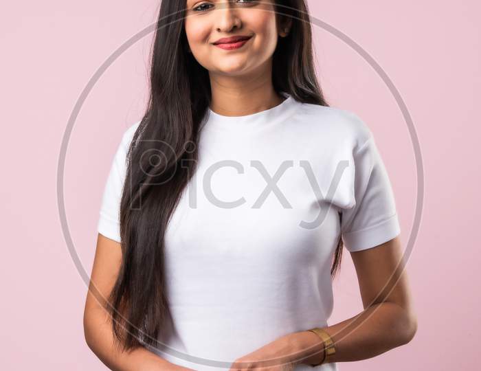 Indian Asian Pretty Young Woman Standing Over Pink Background