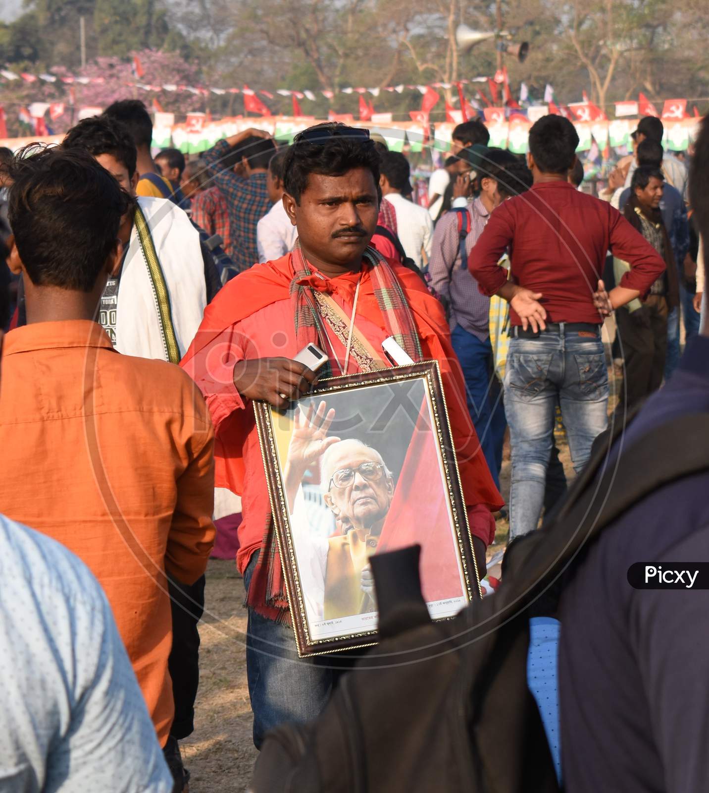 Left Supporter with picture of ex Chief Minister of West Bengal and Firebrand Communist Leader Jyoti Basu