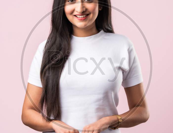 Indian Asian Pretty Young Woman Standing Over Pink Background
