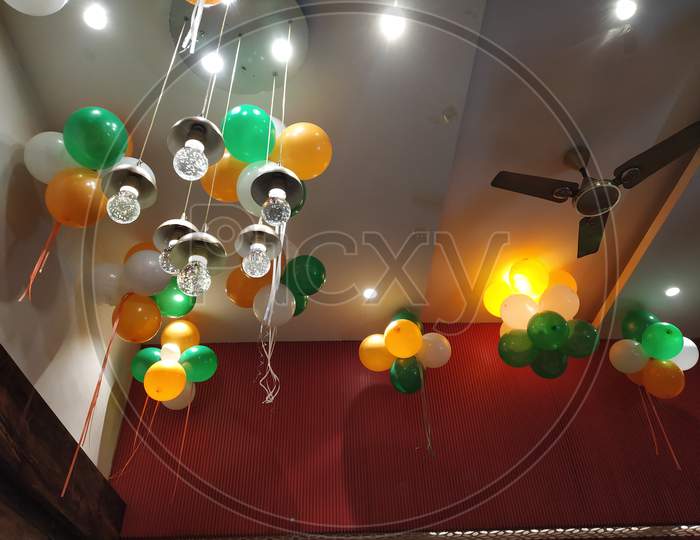 Interior ceiling decoration of a restaurant with balloons,  designed bulbs and lights in a evening at siliguri, west bengal, India.