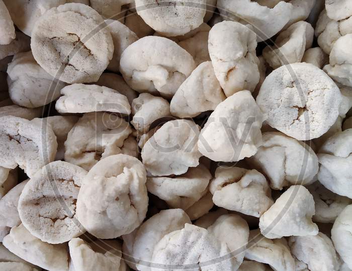 Daler bori or lentil in a full frame. Bori is a form of dried lentil dumplings popular in Bengali cuisine. It is made from a paste of urad dal which is sun-dried for 3–5 days.