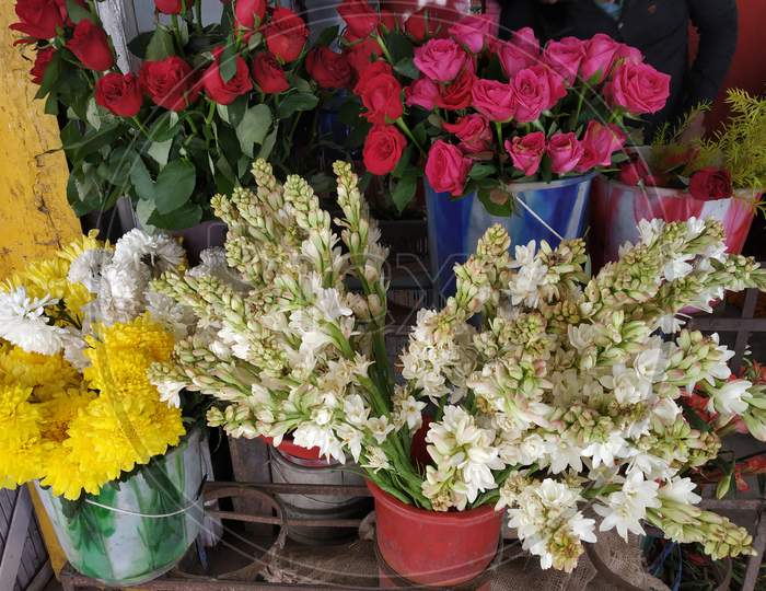Different types of flowers organised in a flower shop near Bagdogra, West Bengal, India.