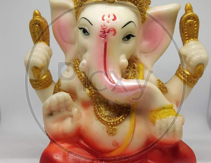 statue of hindu idol Ganesha selectively focused.