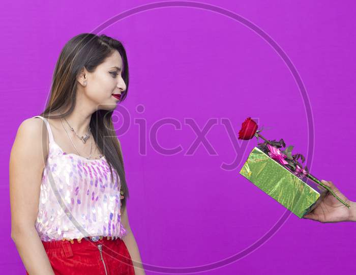 Valentine's Day, Beautiful girl carrying flowers and Gifts from boy on Valentine's Day