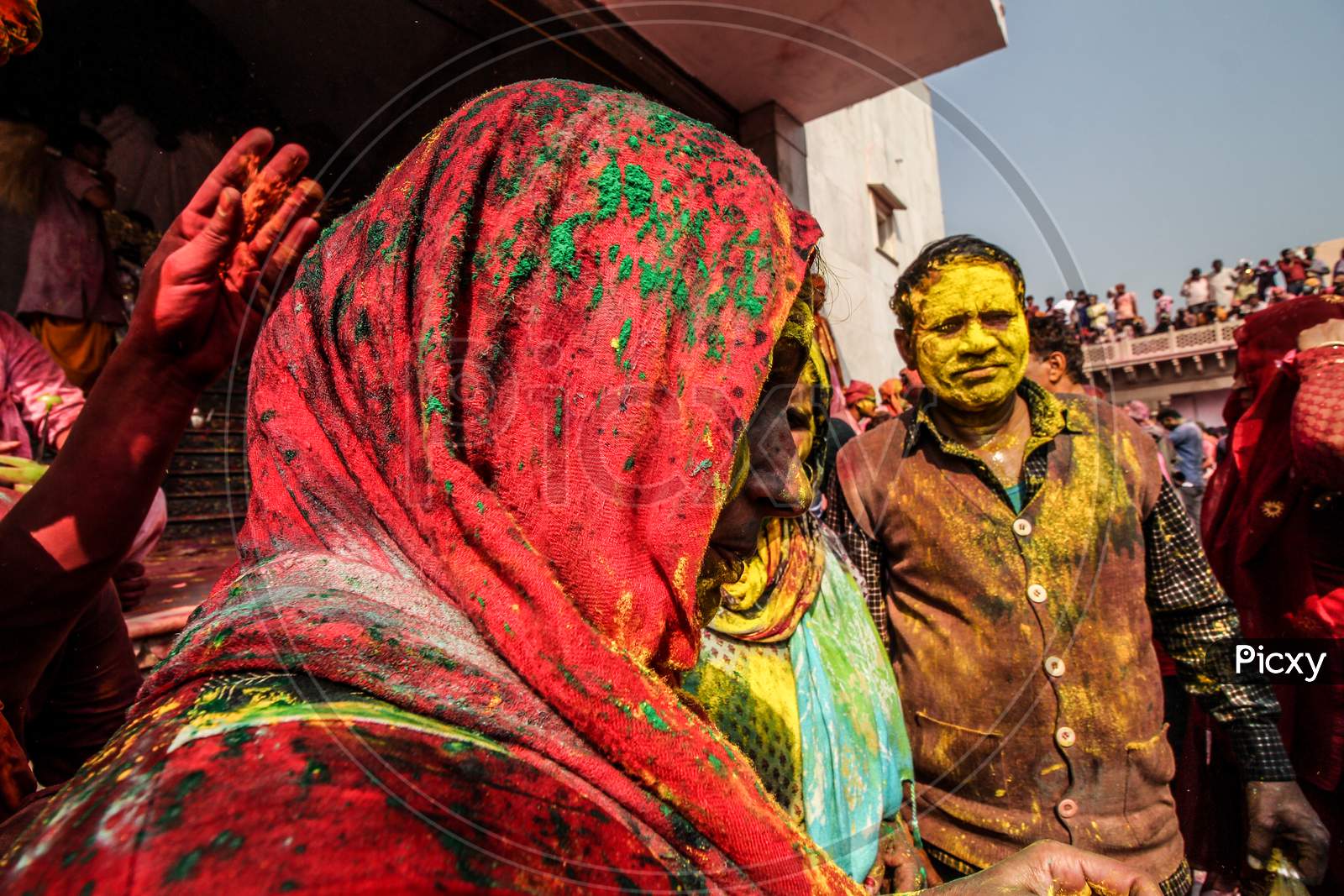 Mathura, Uttar Pradesh/ India- January 6 2020: : Woman Dance Performing At Holi Festival Wearing Traditional Dress People Looking Her,Throwing Color And Clicking Photos.