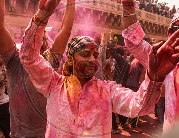 Mathura, Uttar Pradesh, India- January 6 2020: Crowd Of Mathura Celebrating Holi By Playing With Colors Captured In Slow Shutter Speed For A Motion Blur Effect.