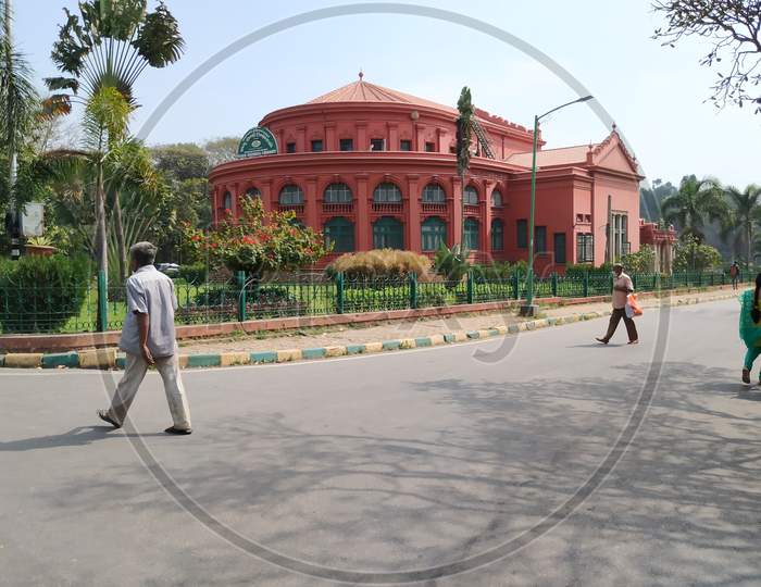 Closeup of State Central Library building at the center of the Cubbon Park.