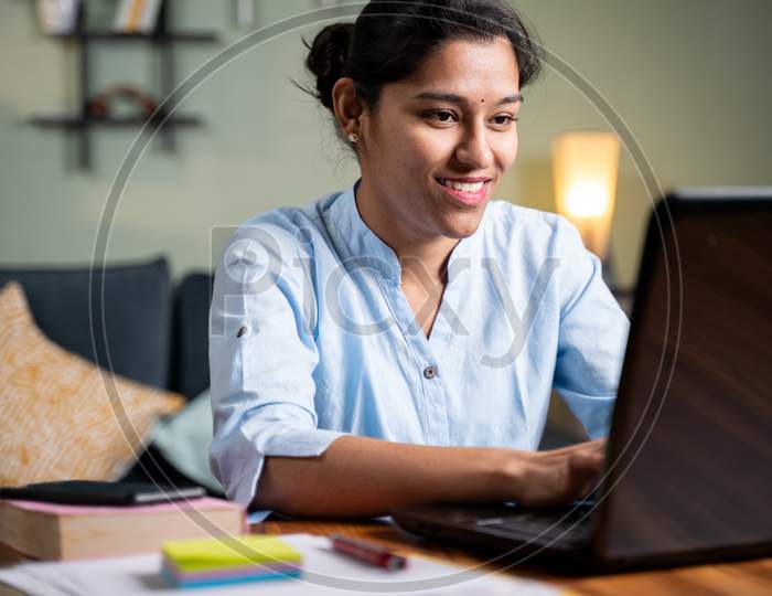 Young Business Girl Busy Working On Laptop At Home In Formal Wear - Concept Of Professional It Employee During Work From Home.