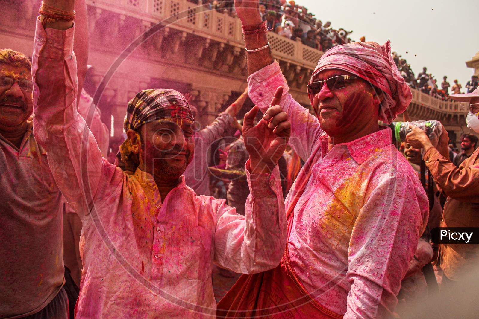 Mathura, Uttar Pradesh, India- January 6 2020: Crowd Of Mathura Celebrating Holi By Playing With Colors Captured In Slow Shutter Speed For A Motion Blur Effect.