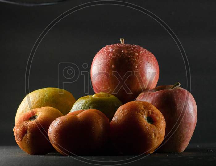Heap Of Fruits In Black Background