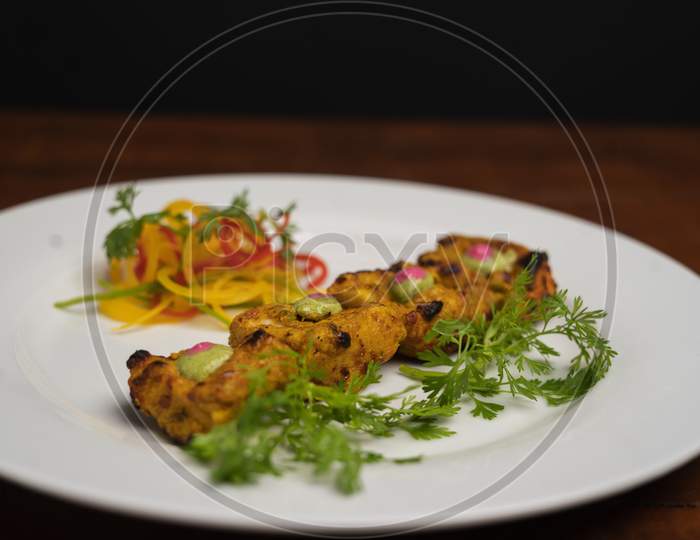 Chicken Skew Kebab.Traditional Indian Dish Cooked On Charcoal And Flame.