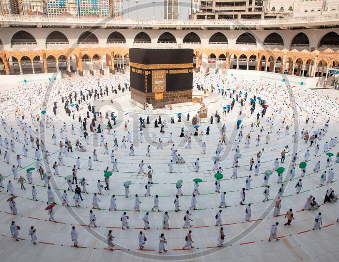 Muslim Pilgrims In Al Haram Mosque Makkah Performing Tawaf , Hajj Season At The Time Of The Corona Covid 19 , Covid 19 Precautionary Measures.Saudi Arabia Makkah At Aug 2020