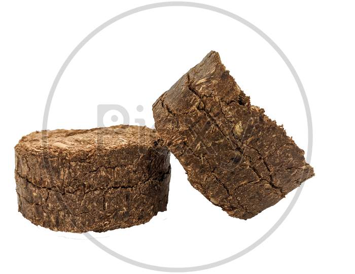 Pieces of brown coal isolated on white background.