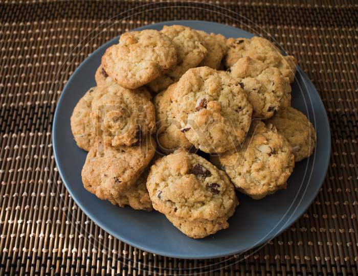 Tasty Chocolate Chips Cookies In A Grey Plate