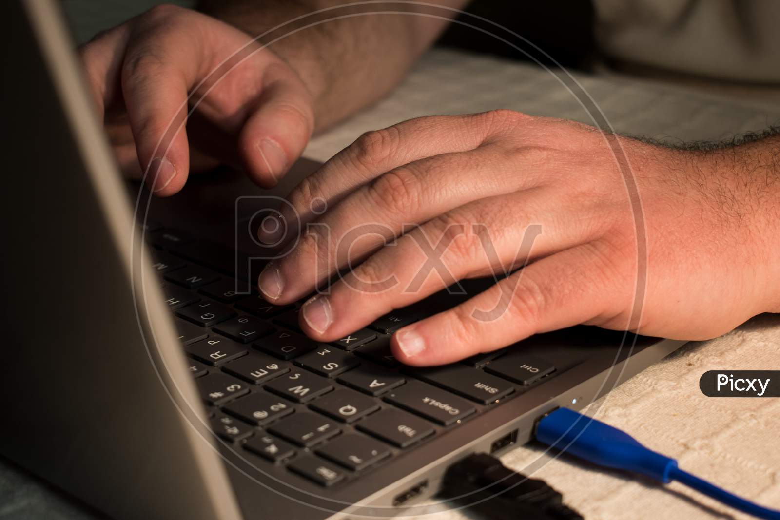 Businessman Hand Typing On Computer Keyboard Of A Laptop Computer
