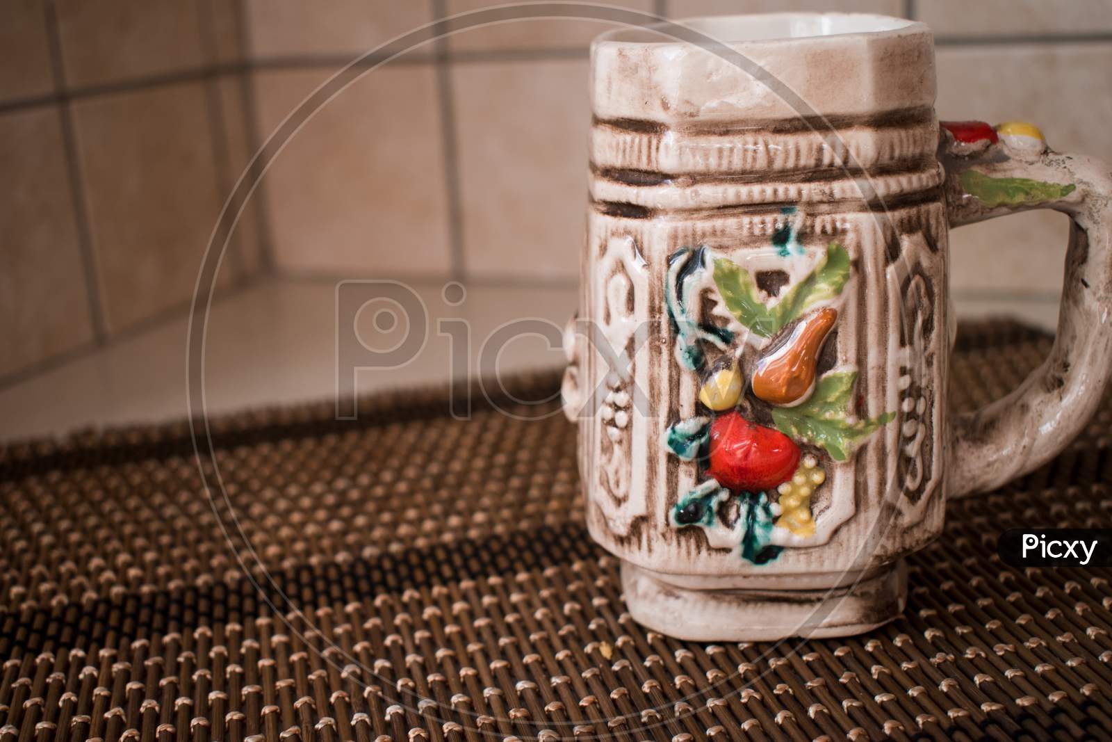 A Colorful Ceramic Empty Mug For Coffee Or Tea. Home Interior.