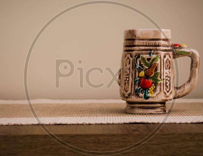 A Colorful Ceramic Empty Mug For Coffee Or Tea. Home Interior.
