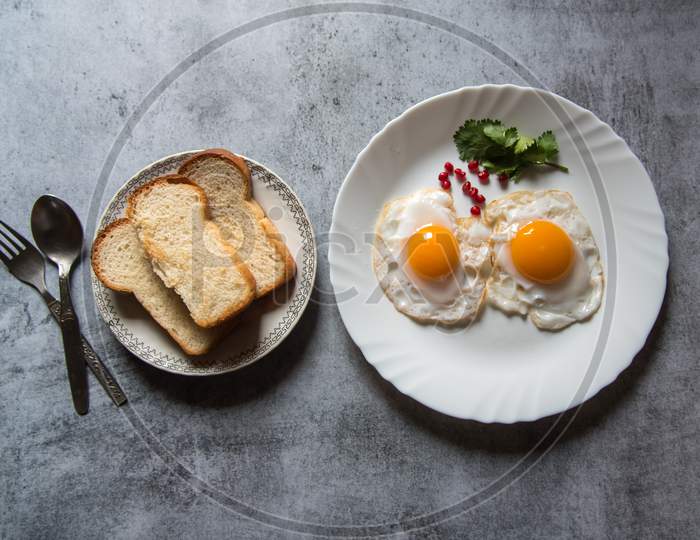 Bread slices and egg poaches are a popular breakfast ingredient.
