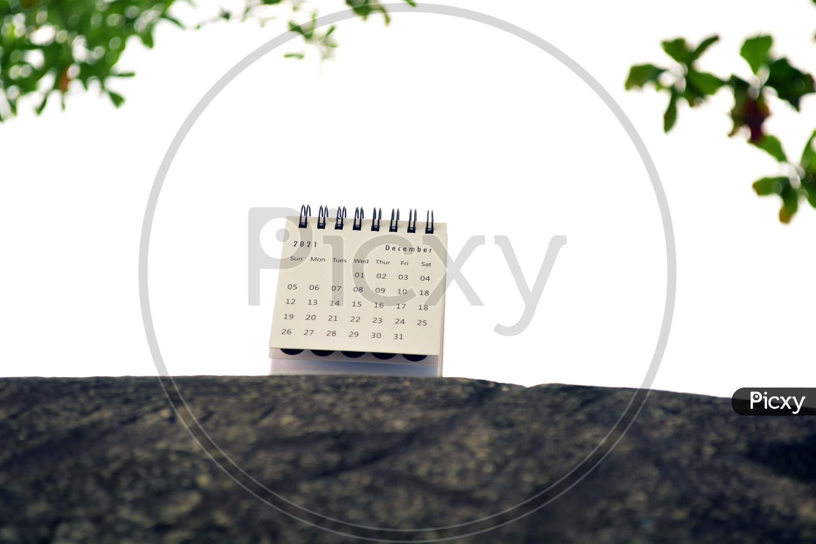 Top View Of December 2021 White Calendar. 2021 New Year Concept