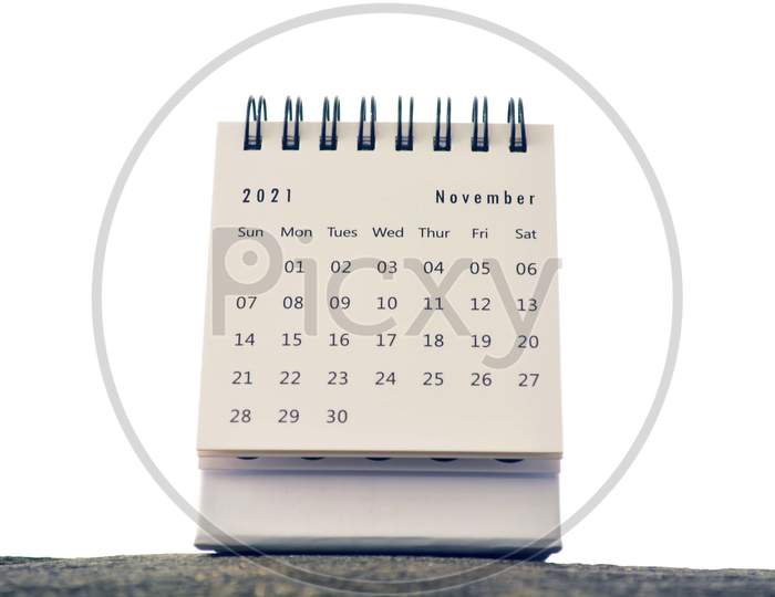 November 2021 White Calendar With White Blurred Background