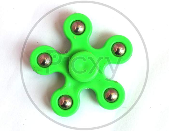 Fidget Spinner, A Stress Anxiety Relief Toy On White Background.