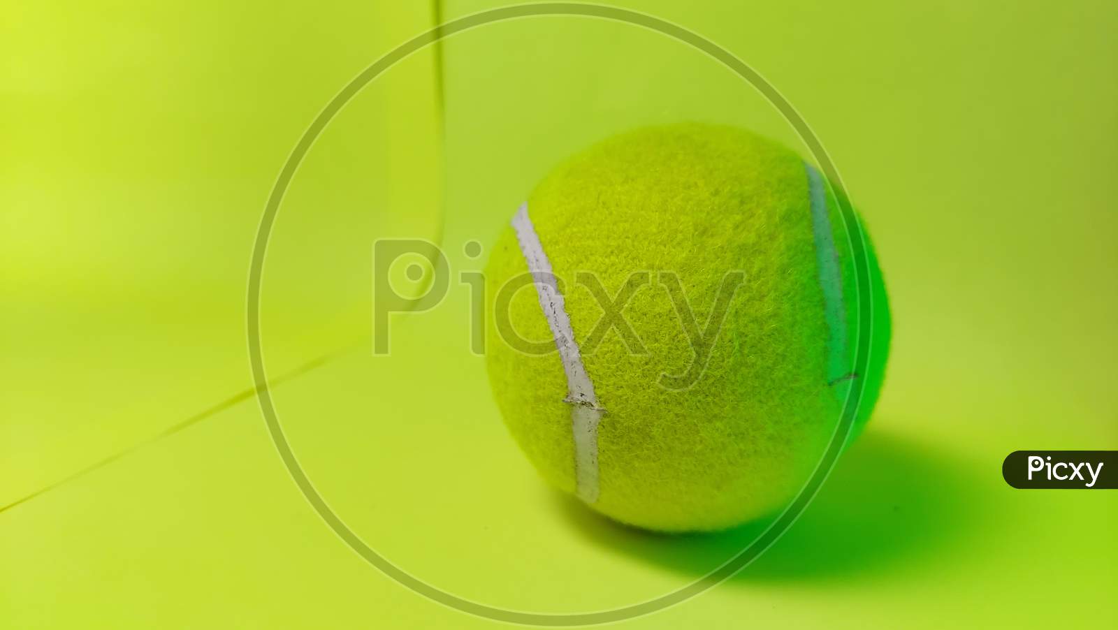 Tennis ball in dynamic lighting