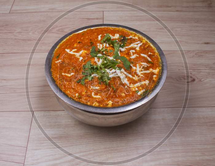 Vegetable Handi Made From Vegetables, Served On Copper Bowl With Lettuce, Spice And Curry