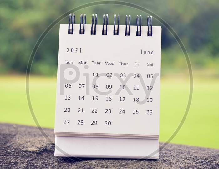 June 2021 White Calendar With Green Blurred Background. 2021 New Year Concept