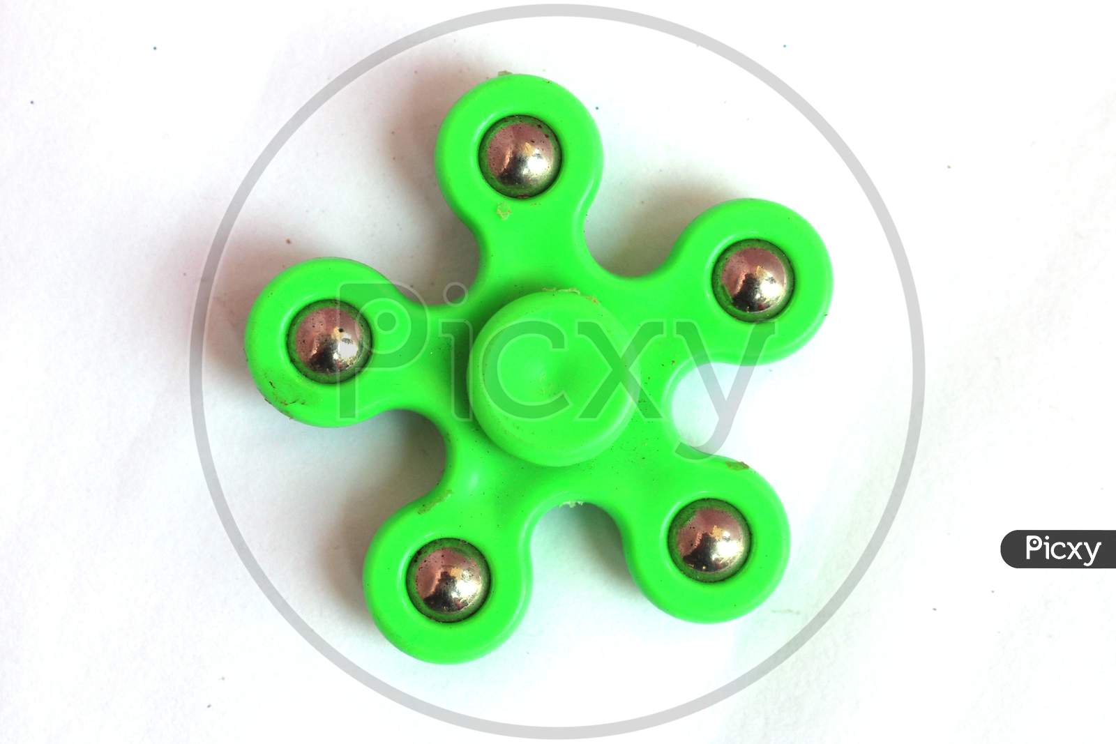 Fidget Spinner, A Stress Anxiety Relief Toy On White Background.
