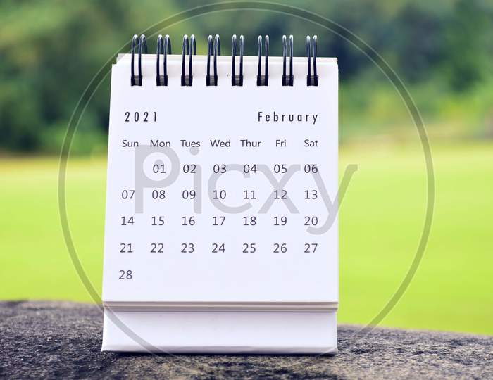 February 2021 White Calendar With Green Background. 2021 New Year Concept