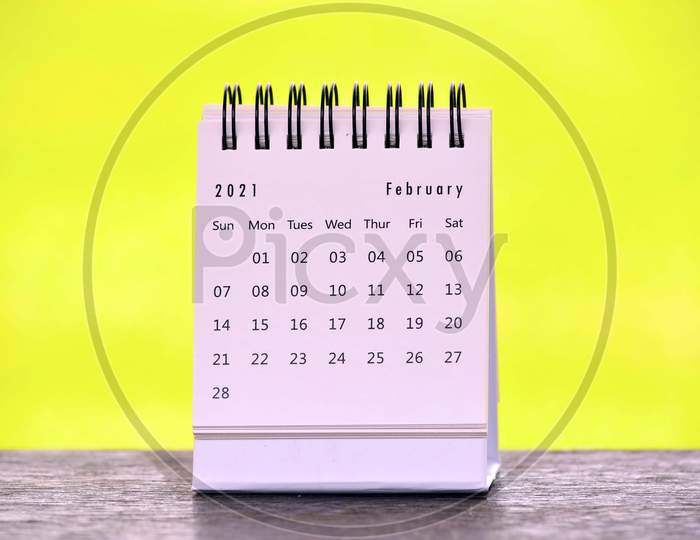 February 2021 White Calendar With Yellow Background. New Year Concept