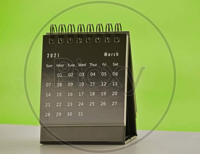 Black March 2021 Calendar With Green Backgrounds. 2021 Concept