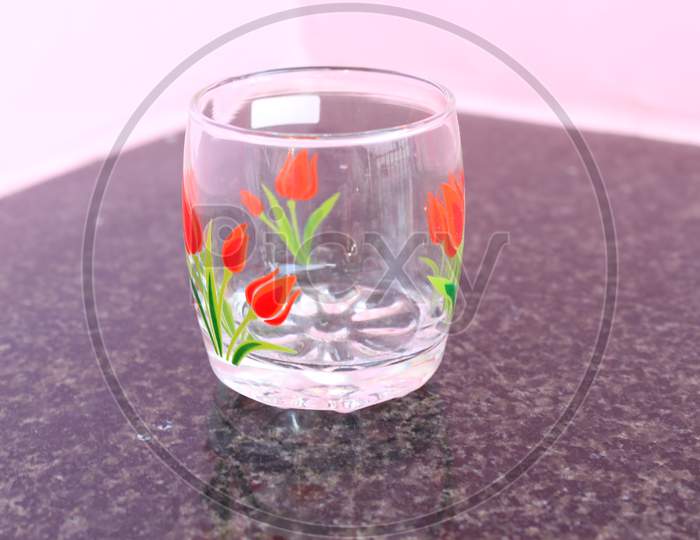 Empty Glass Isolated On Texture Background