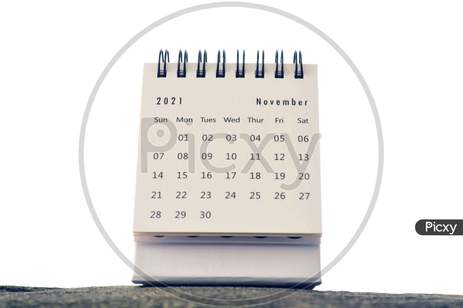 November 2021 White Calendar With White Blurred Background