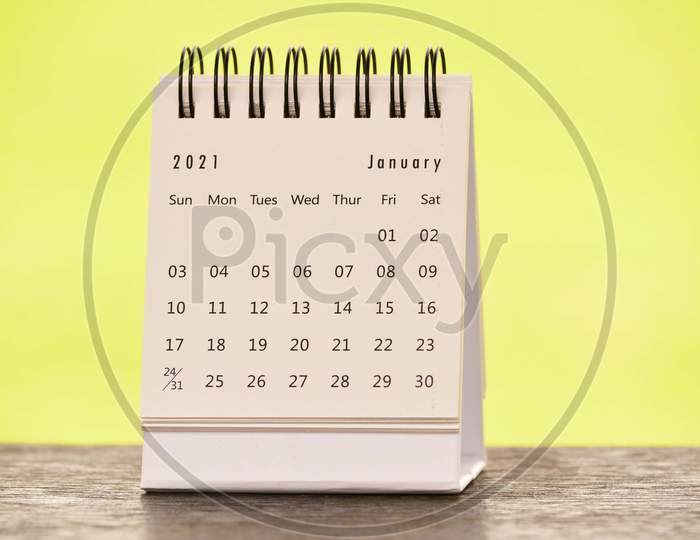 January 2021 White Calendar With Green Blurred Background - 2021 New Year Concept